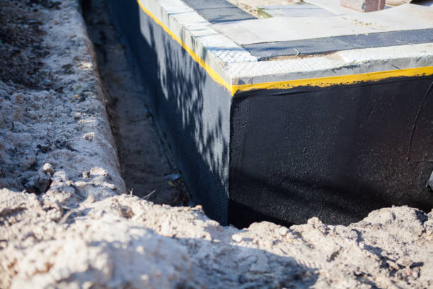 Professional Waterproofing technician working in Elgin, SC